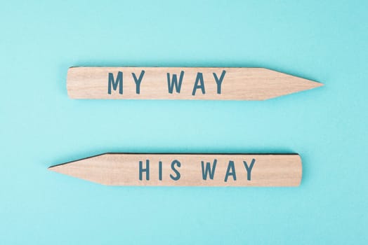 The words my way his way are standing on wooden arrows, christian religion faith, trust and believe concept, religious pray