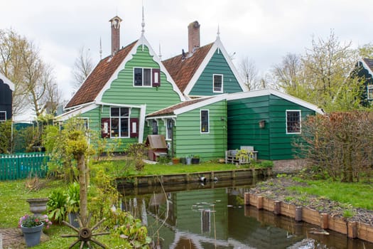 Traditional Houses in the Historic Village of Zaanse Schans on the Zaan River in the Netherlands