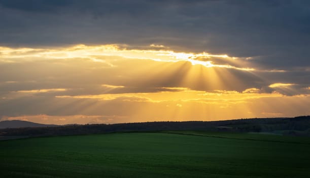 Sun rays on a gap in the clouds in Burgenland