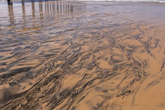 Colorful Sand Where Water Flows to the Ocean in La Jolla, California