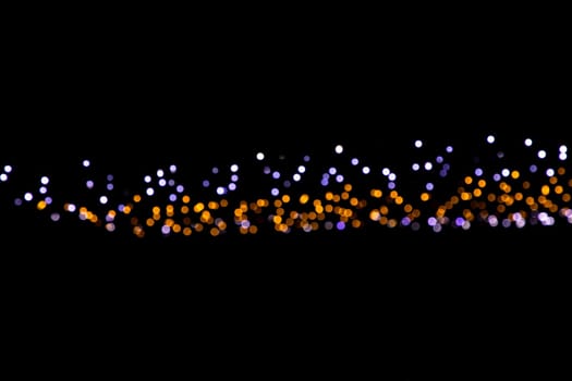 Black background with golden light effects. background with  Blur bokeh effects. Abstract background texture