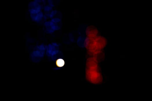 Black background with colorful light effects. background with  Blur bokeh effects. Abstract background texture