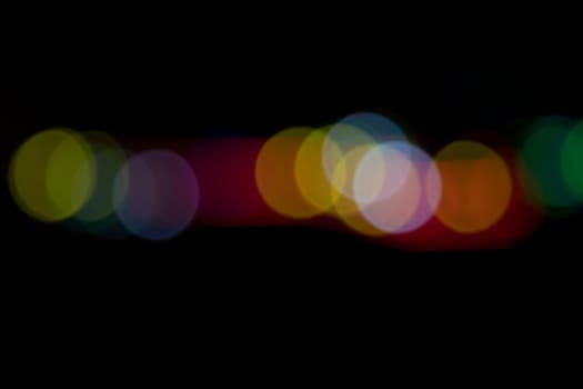 Black background with colorful light effects. background with  Blur bokeh effects. Abstract background texture