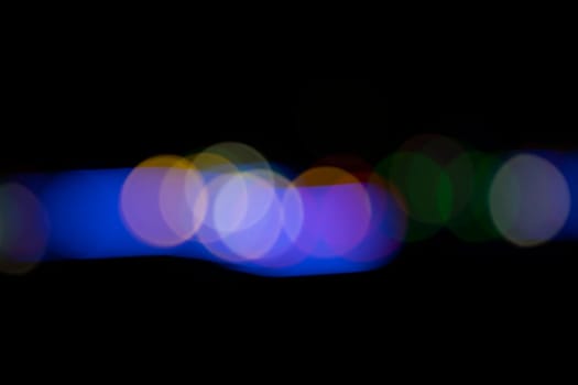 Black background with colorful light effects. background with  Blur bokeh effects. Abstract background texture