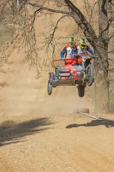 MOHELNICE, CZECH REPUBLIC - APRIL 16, 2022. Unidentified racers rides a sidecar in the "Sidecarcross Championship of Czech Republic"" on April 16, 2022 in the town of Mohelnice, Czech Republic."