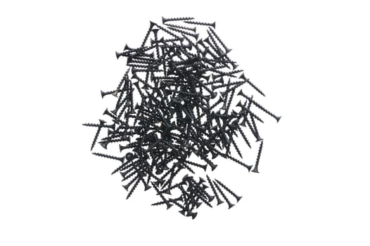 Black construction screws on wood on a white isolated background. High quality photo
