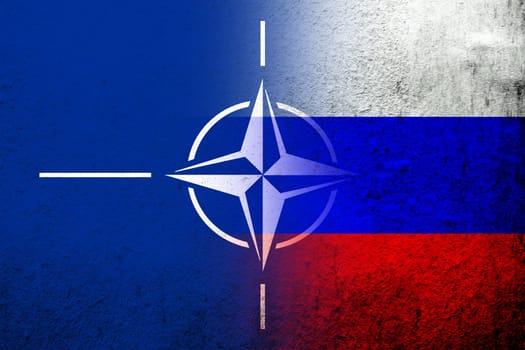 National flag of Russian Federation with Flag of North Atlantic Alliance NATO. Grunge background