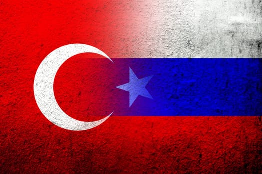 National flag of Russian Federation with National flag of Turkey. Grunge background
