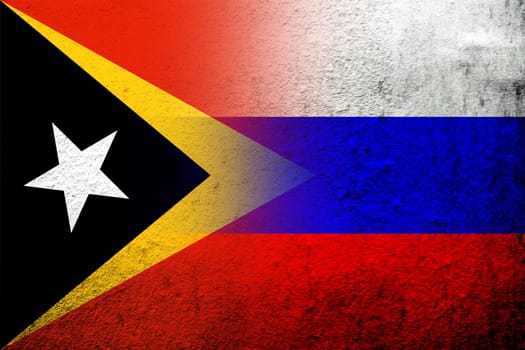 National flag of Russian Federation with The Democratic Republic of Timor-Leste East Timor National flag. Grunge background