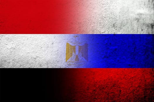 National flag of Russian Federation with The Arab Republic of Egypt National flag. Grunge background
