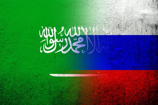 National flag of Russian Federation with The Kingdom of Saudi Arabia National flag. Grunge background