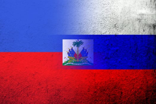 National flag of Russian Federation with the Republic of Haiti National flag. Grunge background