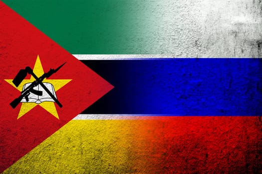 National flag of Russian Federation with The Republic of Mozambique National flag. Grunge background