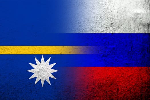 National flag of Russian Federation with The Republic of Nauru Pleasant Island National flag. Grunge background