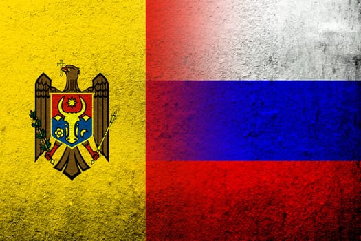 National flag of Russian Federation with The Republic of Moldova National flag. Grunge background
