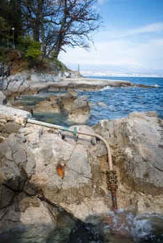 Draining sewage into the ocean