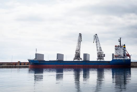 Cranes loading ship