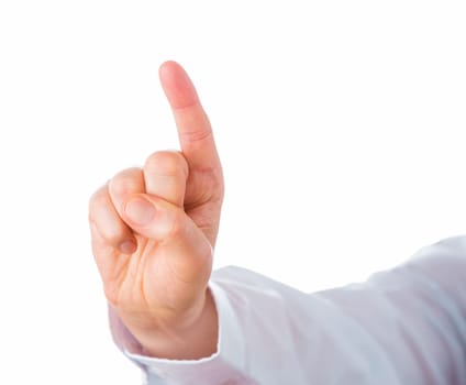 Right hand pointing index finger straight up. Horizontal forearm in plain white shirt in slight perspectival foreshortening. Hand raised vertically upwards in flexed wrist. Cutout isolated on white.