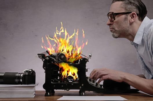 Editor with an old typewriter working on a hot story