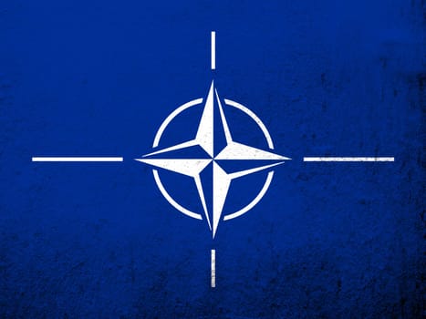 Flag of North Atlantic Alliance NATO. Grunge background
