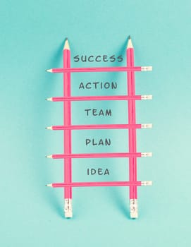 Ladder of success,having an idea, planning a strategy, teamwork for success step by step concept, progress in business and education, have a goal