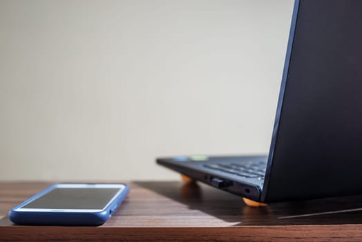 Technology network and online banking and internet banking and networking people concept, Computer Notebook with smartphone mobile on blurred background