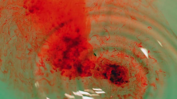 Blood Drops Flowing In Water