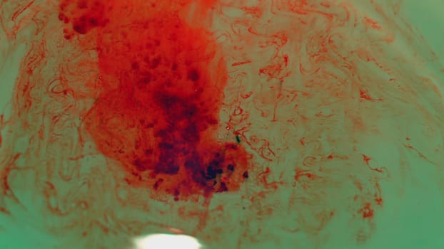 Blood Drops Flowing In Water