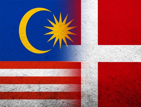 the Kingdom of Denmark National flag with National flag of Malaysia. Grunge Background