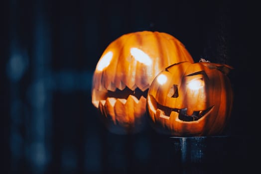 Two pumpkins carved for Halloween celebraiton in street of San Francisco, California, United States of America.