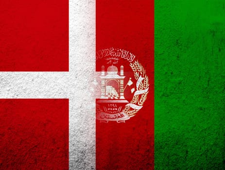 the Kingdom of Denmark National flag with Islamic Republic of Afghanistan national flag. Grunge Background