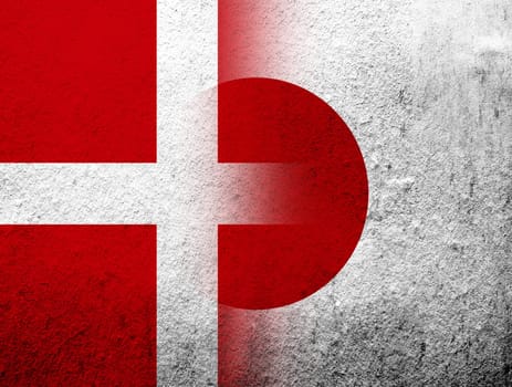 the Kingdom of Denmark National flag with National flag of Japan. Grunge Background