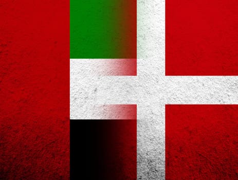 the Kingdom of Denmark National flag with National flag of United Arab Emirates. Grunge Background
