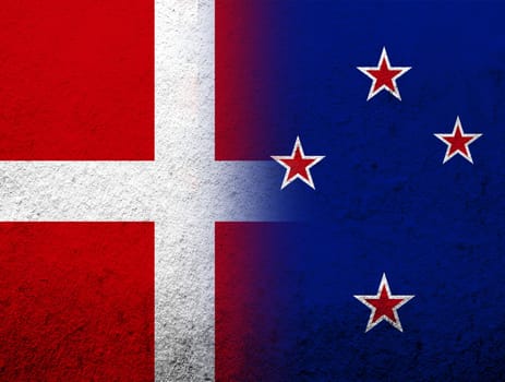 the Kingdom of Denmark National flag with National flag of New Zealand . Grunge Background