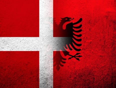 the Kingdom of Denmark National flag with Republic of Albania National flag. Grunge Background