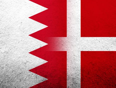 the Kingdom of Denmark National flag with The Kingdom of Bahrain national flag. Grunge Background