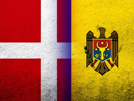 the Kingdom of Denmark National flag with he Republic of Moldova National flag. Grunge Background