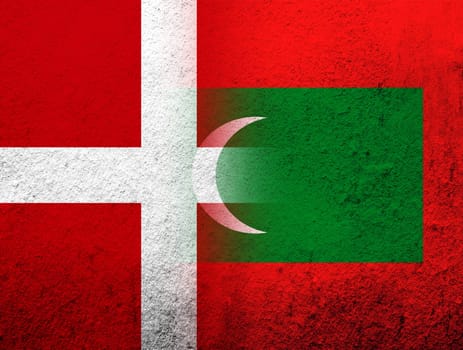 the Kingdom of Denmark National flag with The Republic of Maldives National flag. Grunge Background