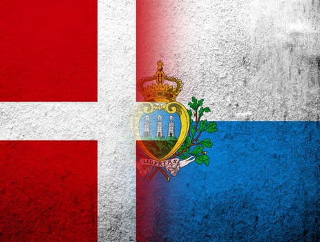 the Kingdom of Denmark National flag with The Republic of San Marino National flag. Grunge Background
