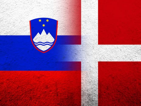 the Kingdom of Denmark National flag with The Republic of Slovenia National flag. Grunge Background