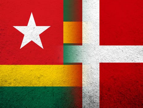 the Kingdom of Denmark National flag with The Togolese Republic Togo National flag. Grunge Background