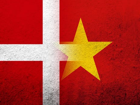 the Kingdom of Denmark National flag with The Socialist Republic of Vietnam National flag. Grunge Background
