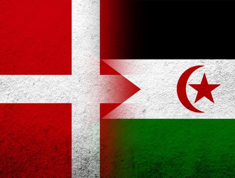 the Kingdom of Denmark National flag with The Sahrawi Arab Democratic Republic Western Sahara national flag. Grunge Background