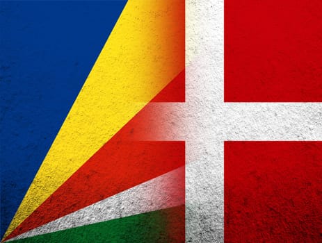 the Kingdom of Denmark National flag with The Republic of Seychelles National flag. Grunge Background