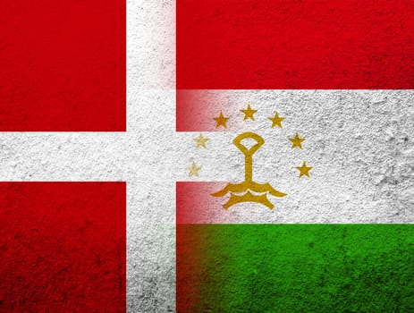 the Kingdom of Denmark National flag with The Republic of Tajikistan National flag. Grunge Background