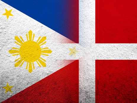 the Kingdom of Denmark National flag with The Republic of the Philippines National flag. Grunge Background