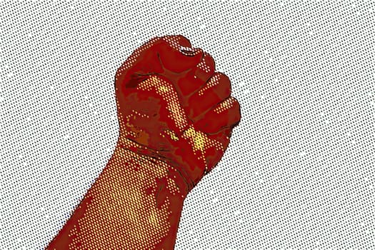 A clenched fist held high in protest
