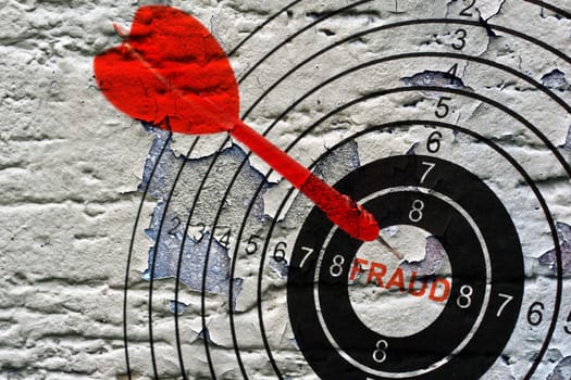 Fraud target on grunge background