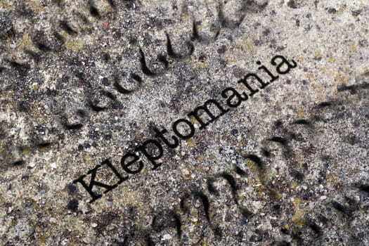 Kleptomania text on grunge background