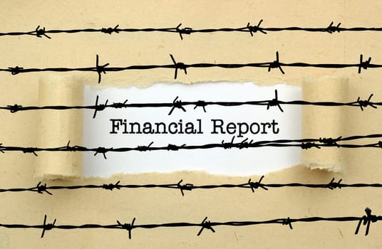 Financial report text against barbwire